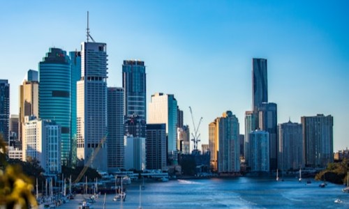 city skyline under clear blue sky during daytime